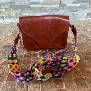 100% leather bag with hand made string strap